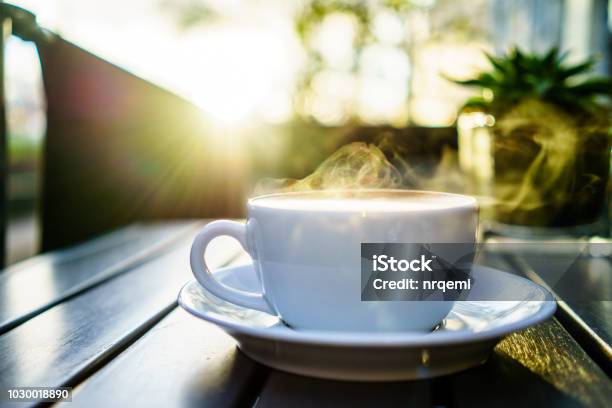 https://media.istockphoto.com/id/1030018890/photo/coffee-mug-with-steaming-on-table-with-morning-lights-in-uk.jpg?s=612x612&w=is&k=20&c=gFPLuHpjtVVP4WVZU_xjQuxJhy_biW3hxpPMUOaO4jY=