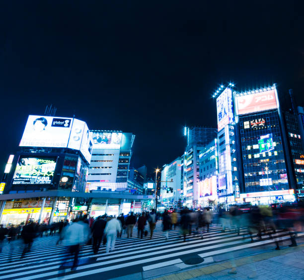 istock Tokyo Crosswalk Scene At Night 1030024600
