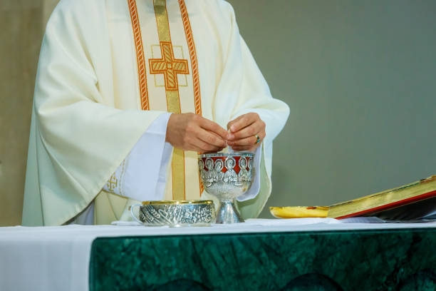 istock Breaking the bread in the church during the communion 1030024902