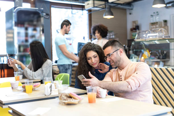 istock Couple taking selfie in cafe 1030071438