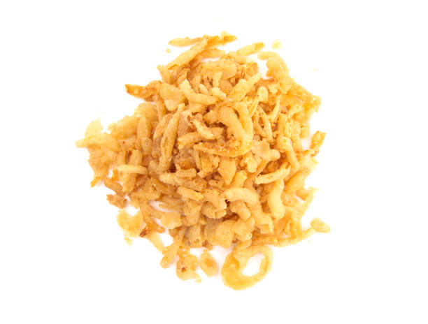 istock Crispy Fried Onions on a White Background 1030077660