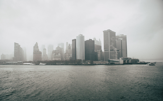 Skyline of Manhattan in a heavy fog. Black and white photo