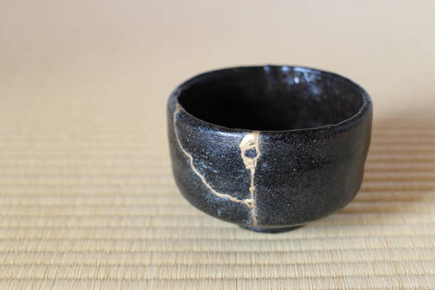 istock Repair of crack pottery tea cup 1030085698