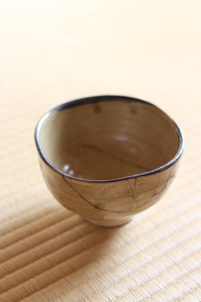 istock Repair of crack pottery tea cup 1030087930