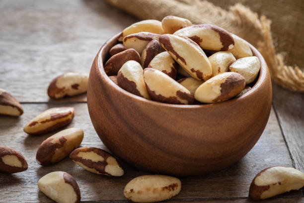 istock Brazil nuts in wooden bowl 1030117594