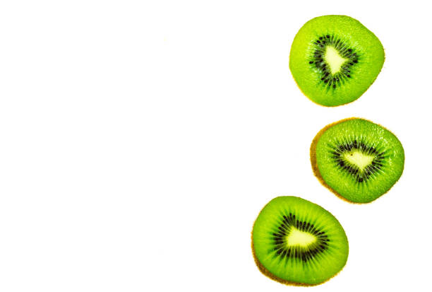 istock Fresh kiwi slice top view isolated on white background 1030128046