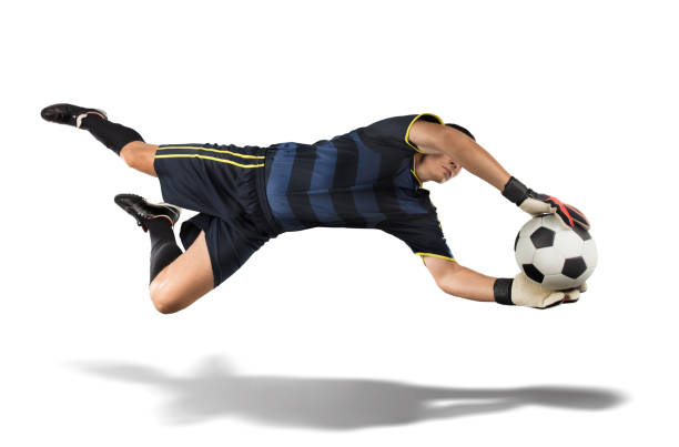 Closeup of a handballplayer about to throw the handball into the goal.