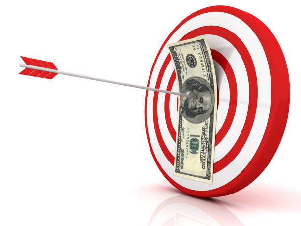 istock Dollar banknote in center of archery target 1030148044