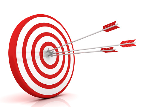 A hit Light Bulb sign on the Dartboard and arrow on the Gray background. Success and Goal Concept.