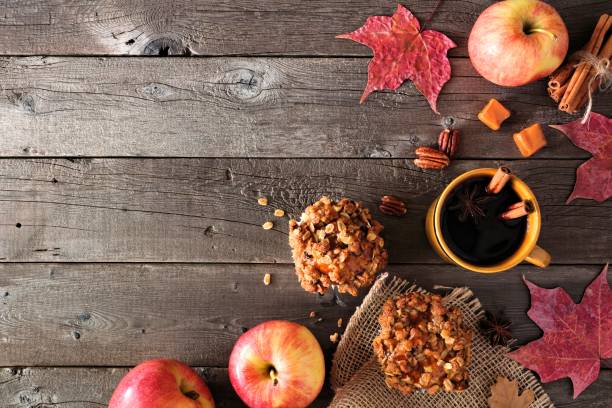 istock Autumn border with apple caramel muffins over rustic wood 1030152194