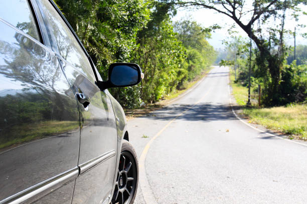 istock Travel car on road trip 1030166970