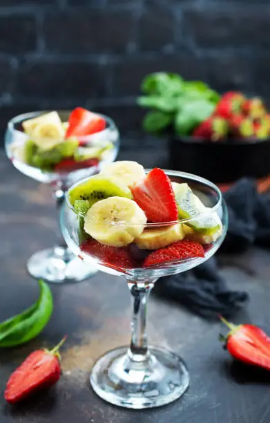 fruit salad in glass, fresh fruits, diet food