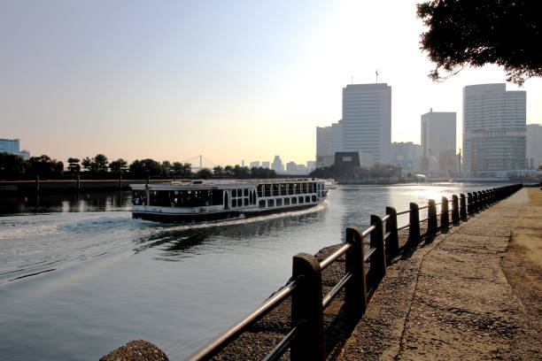 istock A waterbus sailing a canal where a skyscraper can be seen 1030181774
