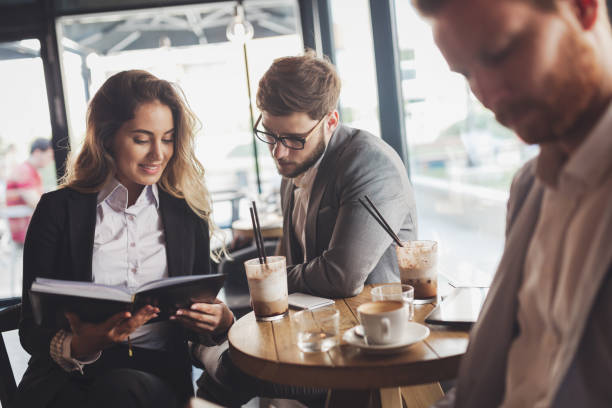 istock Business people talking and laughing together 1030191106