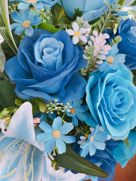 istock A bouquet of artificial blue flowers. 1030191240