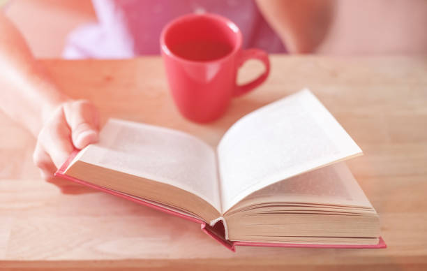 istock Teenager reading a book 1030199444