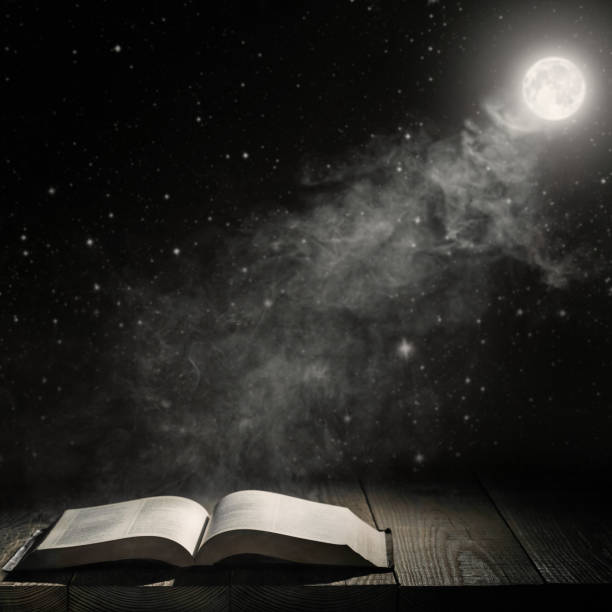 istock moon  shines on the book on the table 1030202144