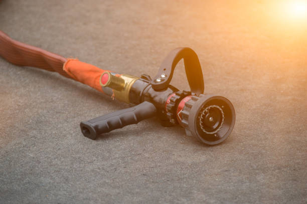 istock fire extinguisher on road for training in factory 1030202146