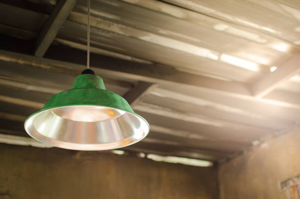 istock Green old lamps hang above on ceiling 1030207860