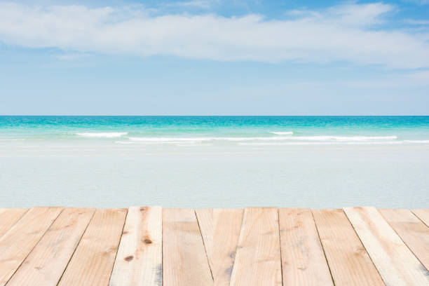 istock Beauty holiday wood terrace on beach 1030215342