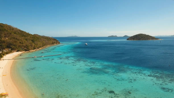 istock Aerial view beautiful beach on a tropical island. Coron, Palawan, Philippines 1030215538