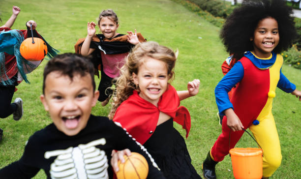 istock Little kids at a Halloween party 1030219008