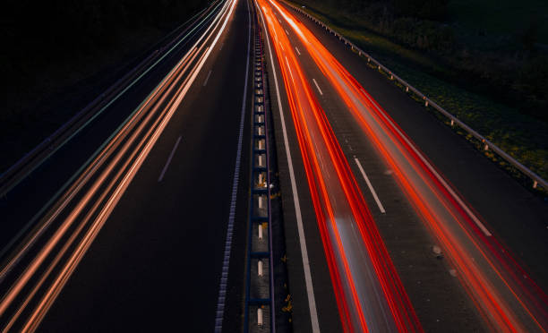 istock Car lights on the highway forming a traffic jam 1030219464