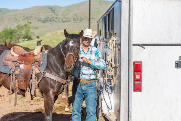 istock Cowboy Getting Ready to Go Horse Riding 1030222050
