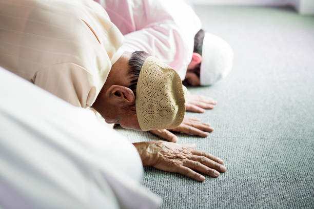 istock Muslim people praying in Sujud posture 1030228562