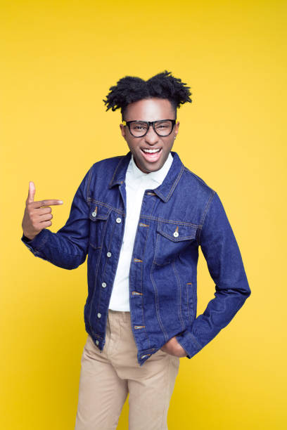 istock 80's style portrait of confident nerdy young man 1030239984