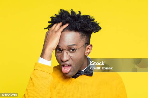 Funny Portrait Of Confident Nerdy Young Man Stock Photo - Download Image Now - Colored Background, 1980-1989, 20-29 Years
