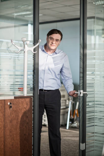istock Businessman entering an office 1030247254