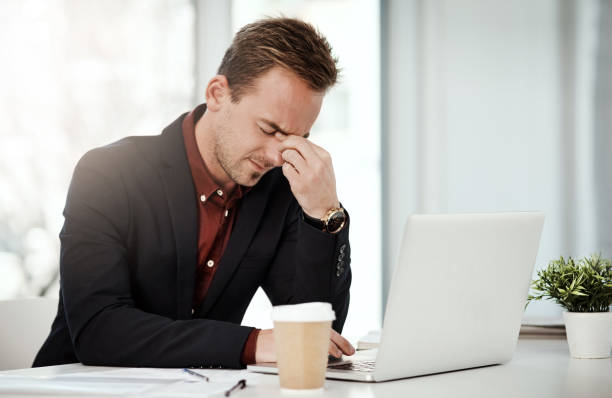 istock I can't focus on my success with this throbbing headache 1030247658