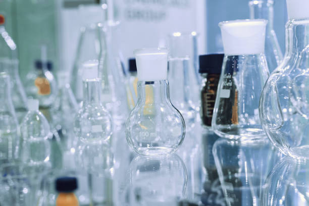 istock Chemical laboratory glassware. Abstract background 1030248760