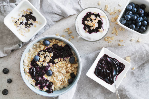 Quinoa porridge with potted blueberries stock photo