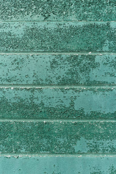 istock Rusty metal wall texture in green tone. 1030259448