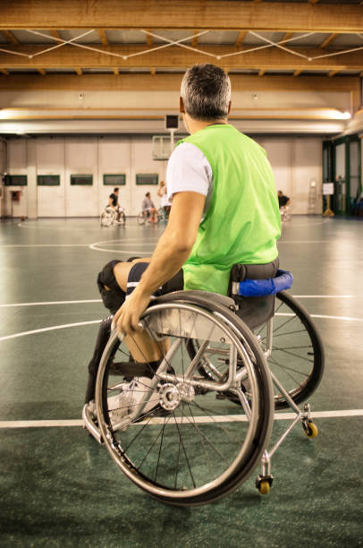 istock Disabled Basketball Players Shaking Hands 1030259988