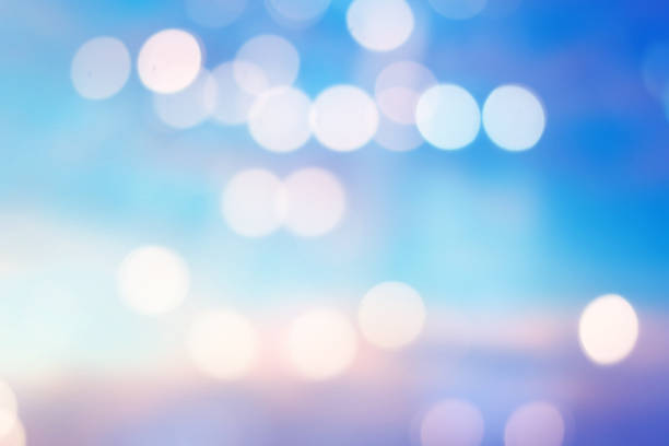 istock blurred beautiful natural pastel background lens ray flare flash light with double exposure of bokeh light 1030263362