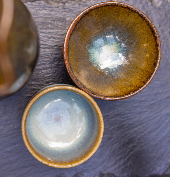 istock Close-up of two Japanese shells for sake on a slate plate 1030264308