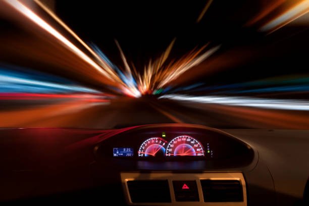 istock Car center console and light trails on the steet 1030268112
