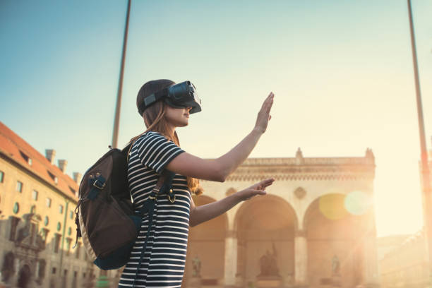 Girl tourist in glasses virtual reality. The concept of virtual tourism stock photo