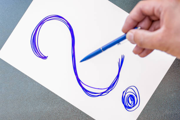 istock Blue question mark with a pen pointing to the question mark 1030277170