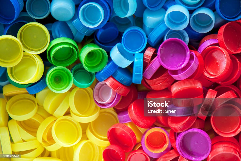 Colored plastic caps. Colored plastic caps in various colors. Plastic Stock Photo Colored plastic caps. Colored plastic caps in various colors. Plastic Stock Photo