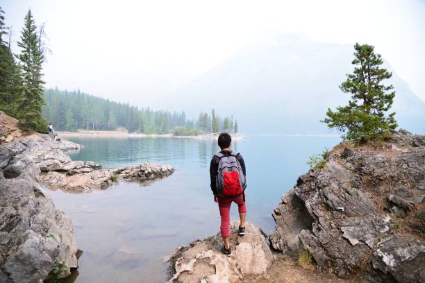 istock Hiker looking at beautiful landscape in late summer 1030280662