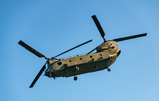 Bournemouth, UK. 1st September 2018. Looking up at the RAF Chinook helicopter flying by.