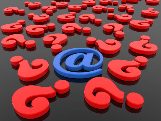 istock At sign in blue with question marks in red around 1030294860