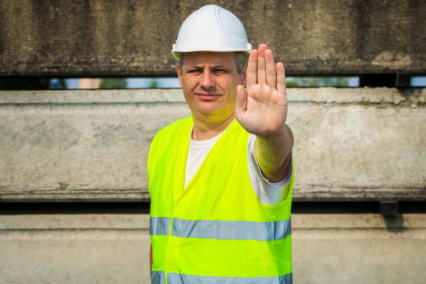 istock Safety inspector showing stop gesture 1030299472
