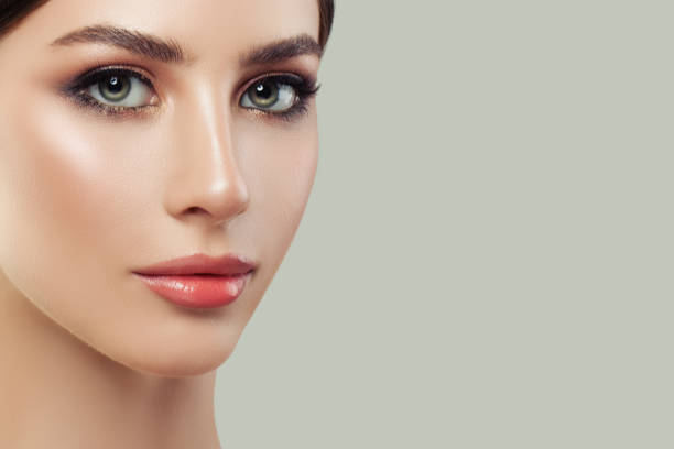 istock Female model face on background with copy space 1030302652