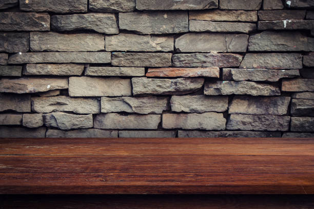 Empty wood table and grunge brick wall and display montage for product.