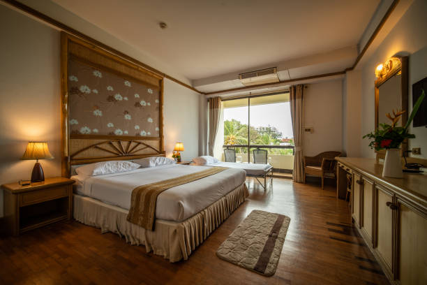 istock interia perspective of double hotel bedroom with one double bed and on extra bed for three persons at Samed Cabana Samed island Rayong district Thailand 1030306814